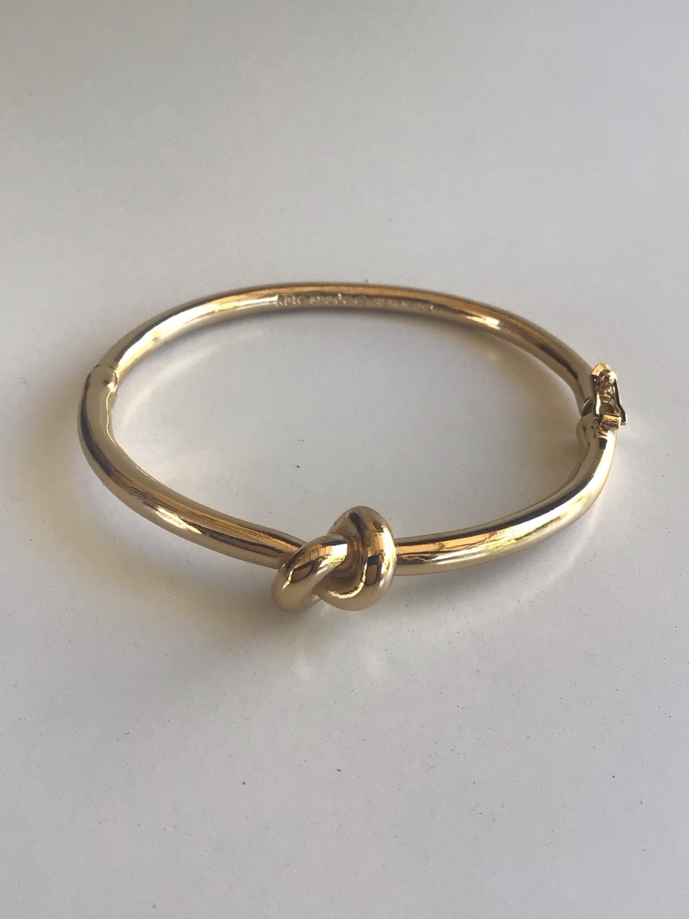 Kate Spade gold knot bangle bracelet